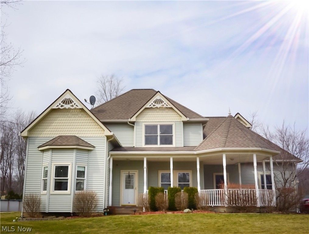 Situated on a half-acre corner lot in the Moore's Landing Subdivision, this meticulously maintained and functionally updated 4 bedroom, 2.5 bathroom Colonial is a must-see! The main floor of this home features an open floor plan with 9' ceilings, a large, eat-in kitchen with beautiful white cabinetry, a half bath, a large storage space (can be used as a mud room), a spacious living room with a built-in bookshelf, and access to the attached two-car heated garage and the fenced-in backyard. In addition, the main floor also boasts an elegant master suite that showcases a glamour bath with a heated Jacuzzi tub and two walk-in closets. The upstairs features three large, remodeled bedrooms, an updated full bathroom, and a bonus room. The lower level was recently finished in 2018 with painted ceilings, wood plank accent walls, plush carpeting, and a tankless hot water tank. In 2017, an additional detached garage and RV/Boat pad were installed at the end of the fenced-in backyard for an additi