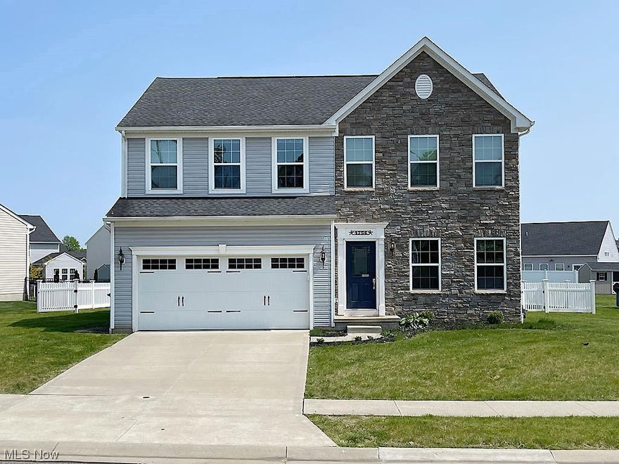 Make your dreams for a new home come true early this summer, with this spacious 4 bedroom, 2.5 bath colonial in desirable Cranberry Creek. Built in 2014, the home has 2384 sq. ft. on just the first and second floors alone, not including the basement! You’ll enter through a welcoming sitting room or first floor office, into the heart of the home; an open floorplan where you'll never be far from the action. The luxury kitchen has 42" custom cabinets, granite countertops, stainless steel appliances and a modern island with seating and storage. It's room enough for the cook and a few helpers, too! The kitchen overlooks a light, bright morning room that flows nicely to the nearby family room, just one of the many rooms with new paint and brand new carpet. The upstairs is sure to impress with a huge 20 ft. master suite and walk-in closet. Down the hall are 3 more good-sized bedrooms, a full bath and laundry room. You’ll love the lower-level rec room. It has a media area with surround sound s