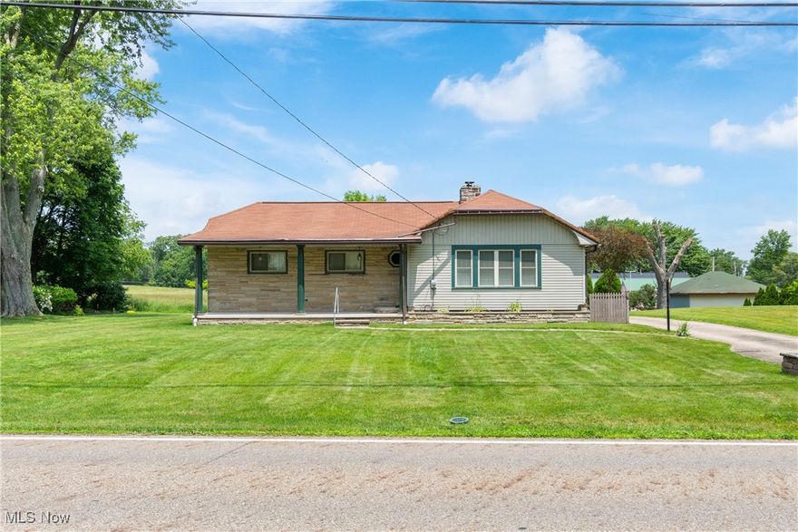 Check out this amazing 3 brm 2 full bath ranch located in the heart of Hartville in the top rated Lake Local School District. This one has been well maintained with many recent updates. As soon as you pull in the drive, you will notice the vinyl exterior, large back deck, good sized 1/2 acre lot and oversized concrete driveway. Garage is oversized at 24x30 (720 sq. ft.) and has 2 new garage doors and one new opener in 2024. As you enter through the backdoor, you are greeted by a 22x11 eat in kitchen with lots of cabinets and all the appliances stay including a new Bosch dishwasher in 2024. Off the kitchen is a 15x12 sunroom with skylights. Front family room with new carpet in 2024. Down the hall is 3 bedrooms, plus a full bathroom new in 2023 with new glass shower doors being installed next week by Hartville Hardware. Master bedroom has his/hers closets with built ins. Lower level has laundry room with washer/dryer included, full bath, storage area plus a rec room area with wood burning fireplace. Pressure tank/softner/water treatment system 19' and high eff. Lenox furnace 14'. This has so much to offer at this price, and will make a great house to call HOME!