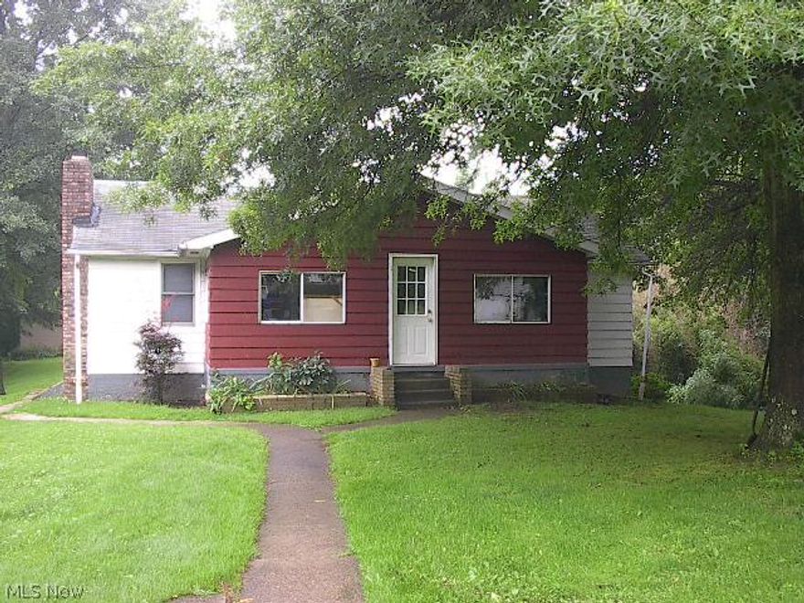 Third bedroom in the basement along with a family room with fireplace and bath. Total of 3 bedrooms. End of street surrounded by woods on three sides. Needs some TLC. If you want close to town but the feel of country this is the place. FA Gas heat. 200 amp breaker service for the electric. Detached garage. Fenced in yard. Closed in sunroom.