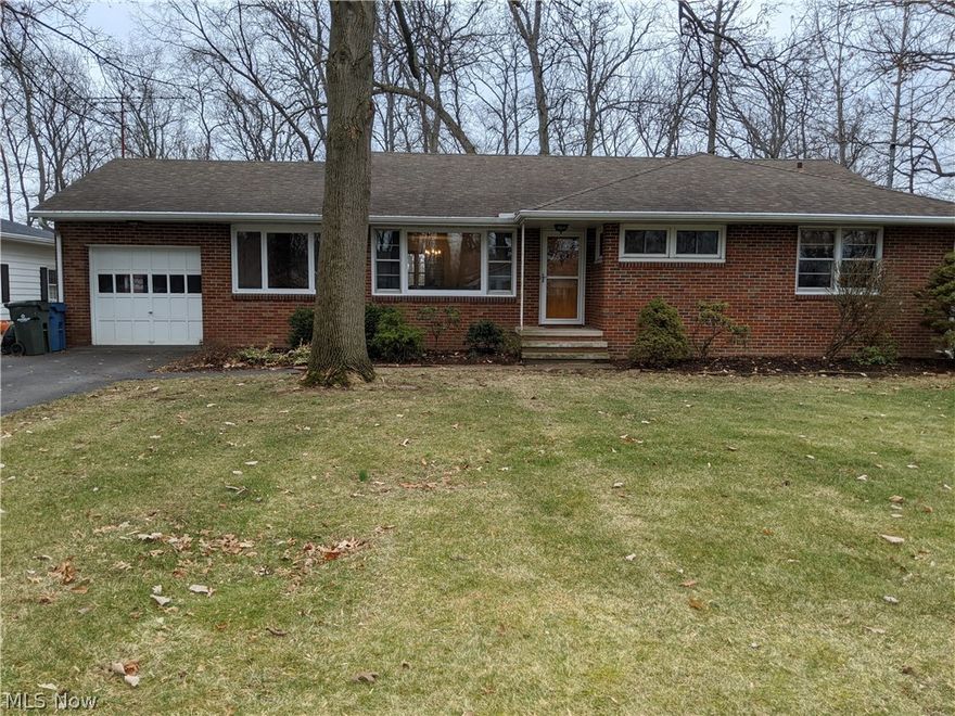 Warmth and comfort describe this brick ranch near the end of a quiet street. The beauty of the home lies in the details of rich hardwood floors, a cozy wood fireplace with gas line for easy conversion, and a beautifully updated kitchen with ample oak cabinetry and warm browns in the countertops and backsplash. Other pleasant features are spacious rooms, built in storage, lots of closets, first floor laundry with basement laundry hook ups, as well, and a 19 x 7 screened rear deck. The home has been modernized for the tech savvy with smart Nest thermostats and a satellite dish. The basement has been waterproofed and offers space for many uses. Located close to schools, downtown shopping, and a quick access to Rt. 2. Don't let this one pass you by!