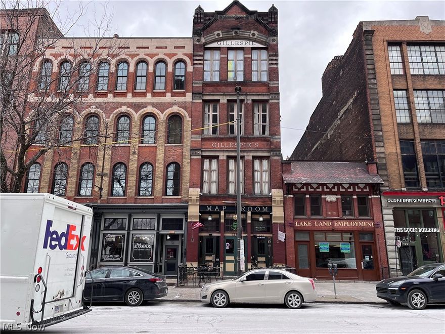 Amazing location on 3rd floor above the MapRoom on West 9th.  Walk to entertainment, the Flats, the games, E. 4th and Tower City.  Minutes from the lake and W. 25th.  Wide open space with 20' ceilings and huge windows overlooking W. 9th.  Granite countertops with raised bar open to the living space with hardwood floors and exposed brick walls.  Open ceiling bedroom, with full bath across the hall.  Laundry hook ups in bathroom for your convenience.
First month and security deposit due at lease signing.