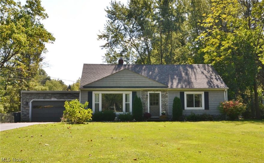 Welcome Home! This adorable North Solon ranch on nearly 2 acres. From the moment you enter the front door, you will notice the beautiful dark hardwood floors, modern finishes & natural light from the large picture window, this L shaped living/dining room combination gives you plenty of open space to entertain in. The large master suite is a true retreat for relaxation, including full bathroom w/tiled shower & granite countertop. Two additional bedrooms w/hardwood floors & another full bath w/granite counter. The newly renovated kitchen is perfect for entertaining w/granite countertops, glass subway tile & hardwood floors. It is open to the large addition on the back of the home which the current owners converted from a 3-season rm to a perfect family rm area w/baseboard heat & vaulted ceiling (2016). French doors lead from family rm out to the newer deck (2016) which overlooks the backyard w/ tons of open space and wooded views. The front section of the backyard is fenced in completely