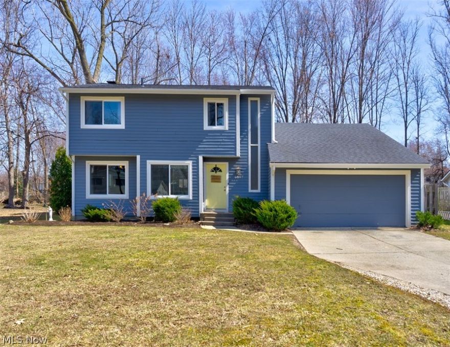 Located in the heart of Mentor and close to shopping, entertainment, and with easy highway access, this tastefully renovated 4 bedroom, 2.5 bathroom Mentor Colonial is a must-see! The main floor of this gorgeous home features an updated kitchen with white cabinetry, newer stainless steel appliances (2018), built-in bench seating with additional storage underneath, and a cut-out overlooking the Great Room.  The main floor also boasts a spacious Great Room with vaulted ceilings, a charming wood-burning fireplace, a formal dining room, a large bedroom that can serve as a first-floor master, guest bedroom, or office/bonus room, a half-bath, a laundry room, and easy access to the covered patio and backyard. The upstairs of this home has a master suite with a full bathroom, two additional bedrooms, an additional full bathroom, and an airy loft overlooking the Great Room. Other features of this home include neutral paint throughout, a large, unfinished lower level waiting for a finishing touc