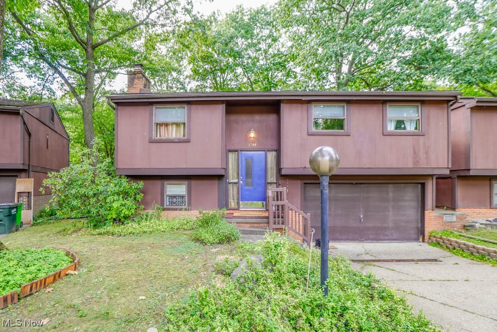 Enjoy condo living with a private wooded backdrop in Massillon's desirable Ledgewood community. The bi-level layout features an open floor plan connecting the living room to the eat-in kitchen on the main level, along with three bedrooms and a full bath down the hall. The lower level adds a comfortable family room with a wood-burning fireplace and walk-out access to the deck. You'll also find a half bath, laundry room, and convenient entry to the attached two car garage. Set in a prime location, this condo is close to Belden Village amenities as well as shopping and dining in Massillon. Schedule your showing today!