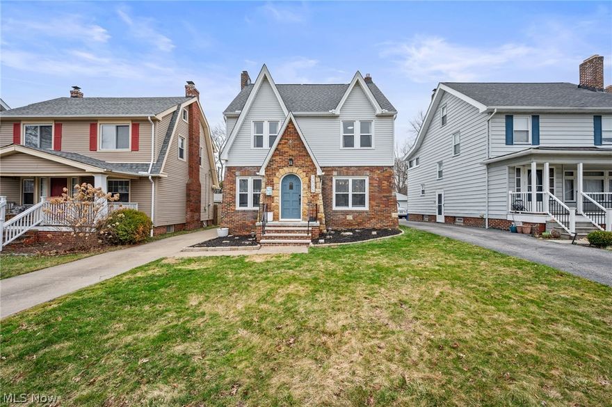 Welcome to 3525 Silsby Rd; located in the heart of University Heights, this charming and beautifully updated Colonial perfectly blends timeless character with modern design. From the moment you arrive, the home's classic brick and stone facade creates warm and inviting curb appeal. A custom red oak front door built and installed in 2020 adds a striking focal point, while the rebuilt front stoop (2025) and newer roof (2019) offer peace of mind and lasting value.

Inside you'll find rich hardwood floors flowing throughout. The living room is anchored by a stately decorative fireplace, creating an elegant yet comfortable gathering space. The modern kitchen features exposed brick accents and a breakfast bar, perfect for casual mornings or entertaining guests. The first floor also offers the convenience of a combined laundry and mudroom, along with a powder room.

Upstairs, you'll find three spacious bedrooms and a beautifully updated full bathroom. The third floor offers flexibility, featuring a private fourth bedroom complete with its own full bathroom; ideal as a secluded primary suite, guest retreat, or private home office.

The finished basement expands your living space even further, providing the perfect setting for a rec room, home gym, or media area, while still offering additional unfinished space for utilities and storage.

Outside, the backyard is designed for both relaxation and entertaining. A fully fenced yard provides privacy, while the enclosed rear porch offers a comfortable three-season retreat (four if you're brave!).  Just beyond, a stamped concrete patio creates the perfect setting for outdoor dining and summer gatherings. Completing the property is a newer, large two-car garage, providing ample parking and additional storage.

Beautifully maintained, thoughtfully updated, and ideally located near shopping, dining, parks, and all that University Heights has to offer, this 4-bedroom, 2.5-bath Colonial is ready to welcome its next chapter.