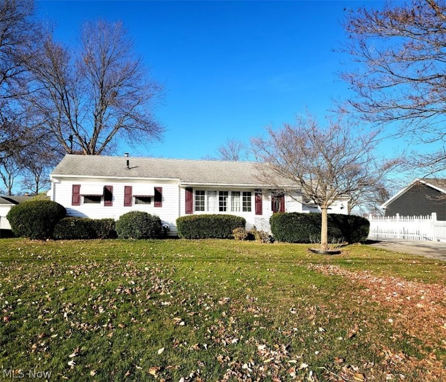 Ready for a ranch? This cozy, well-cared for Barberton home is situated on a quiet street and offers convenient one-floor living! An updated kitchen overlooks the family room so it's easy to cook and entertain at the same time.  Formal dining room, living room, and two inviting bedrooms plus a full bath complete the main floor. Enjoy views from the lovely Four Seasons room where you can enjoy your morning coffee or relax and unwind at the end of the day. The partially finished lower level offers even more living space and features a half bath, workshop and rec room for entertaining, plus a shower stall in the laundry room.  You'll appreciate the attached two car garage with easy-care Nature Stone flooring. The low-maintenance yard is fully fenced and is beautifully landscaped. Hardwood floors under the carpet in the front living room, dining room & bedrooms. Roof appx 10 years, Water heater 3 years, HVAC 11 years, kitchen appliances appx 7 years. Bring your finishing touches and make i