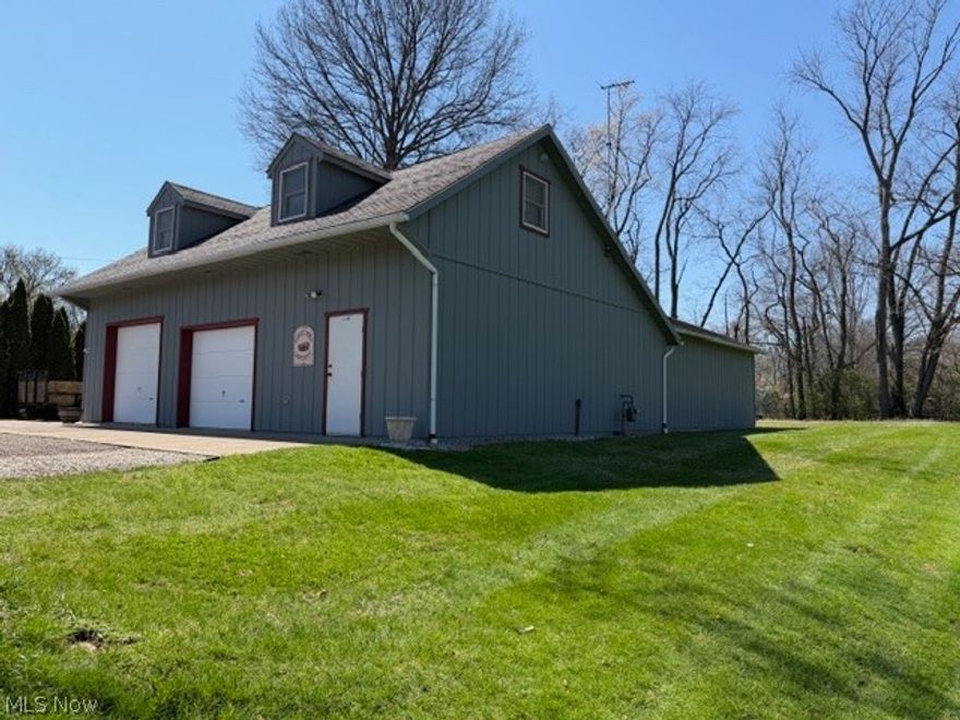 Amazing investment opportunity with endless potential! Looking for a place to operate your business or store equipment? This commercially zoned property offers flexibility and immediate income, as the home is currently tenant-occupied. It has its own driveway and 1 car garage. The spacious 2802 sq. ft. heated outbuilding/ workshop features 4 overhead garage doors. 1/2 bath and fully finished 2nd floor on front section - perfect for office/ workspace. Situated on over 1/2 acre lot with ample parking and room to accommodate a variety of uses. Located on a high traffic street with excellent visibility, this property is just minutes from everything in town. Don't miss this versatile, income-producing opportunity with outstanding business potential!