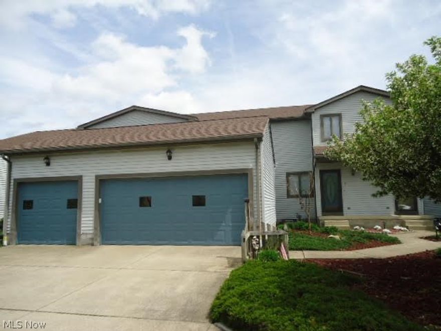 This beautiful condo has so much to offer! There is a wonderful 2 story foyer with hardwood floor, nice living room, large great room that has a gas fireplace with marble hearth as well as a built- in wall unit with desk  and two sets of French doors that open to a 28x10 wood deck.  There is a lovely formal dining room with a pretty picture window, hardwood floor and French doors that open to the great room. Off of the dining room is a spacious kitchen with hardwood floor, pantry, plenty of cabinets and upgraded appliances that remain. The first floor laundry has hardwood floor, cabinets and built- in ironing board. There is an attached 3 car garage with pull down steps to an attic. The second floor features a fabulous master bedroom with a built- in wall unit, two spacious closets and a great master bath 20x9 that has been updated with a ceramic tiled shower, Jacuzzi, and double bowl sink vanity with makeup area. The second bedroom has a full bath and a large 11x13 closet as well as a