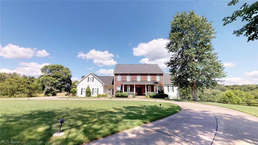 Conveniently located just a few minutes from Parkersburg & Vienna lies a majestic property of 8.35 acres with a 7135 sq ft traditional home with 5112 SF above grade and 2123 SF below grade, and carriage house. Enjoy beautiful sunrises and sunsets on the expansive back porch or in a rocking chair on the front porch. Styled after a Southern Living home of the year, this five-bedroom 5.5 bath home has all of the charm and character of an older home. This home was built in 1997 and only has had one family reside in it thus far. It features two master bedrooms, one upstairs and one downstairs, a full finished basement, a handcrafted wine cellar and bar, a handcrafted office with built-in bookshelves, and a gourmet kitchen and pantry. Acreage would be acceptable for horse pasture. It is in immaculate condition. A must-see. New Survey available.  Taxes to be determined.