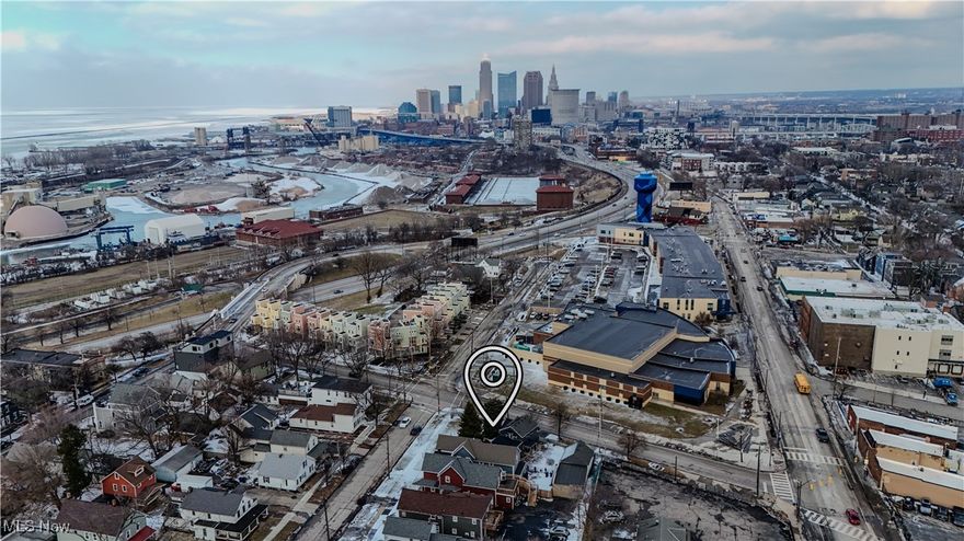 Prime Real Estate for Sale! Two different parcels and addresses (4901 Tillman ave and 1370 W 49th). This exceptional property is ideally located near Battery Park, Gordon Square, and Ohio City- three of Cleveland's most sought-after neighborhoods, brimming with exciting new development, restaurants, shops, bars, and nightlife. RARE CORNER LOT with stunning lake views from the current commercial building, offering a one-of-a-kind opportunity. Edgewater bike path access is also located directly at the end of the street. Take advantage of this unique location to reconfigure the existing structure or embark on a new development project. Currently zoned residential, with a commercial building already on the land, the conversion process is expected to be straightforward with the city's approval. Easy access to major highways, just minutes from Downtown Cleveland, and close proximity to renowned hospitals make this property an ideal choice for businesses or personal development. On the desirable west side of Cleveland, this property offers not only convenience but an unbeatable location in one of the city's fastest-growing areas. Whether you're considering a renovation, expansion, or starting fresh, this property provides the flexibility for multiple possibilities. Don't miss your chance to own a piece of this vibrant neighborhood with limitless potential. Contact us today for more details!