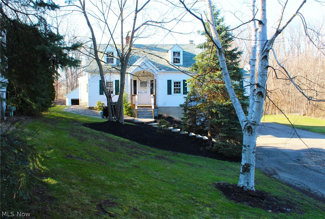 Priced to sell! Auditors site values this at $188,000.00! Wonderful location in close proximity to the Mentor Mall. Situated on nearly half acre with a wooded view. Big living room with a fireplace. Refinished hardwood floors. Newer ceramic tile in bathrooms. Enclosed patio to view the spacious backyard. Complete with a good sized detached garage along with an attached garage.