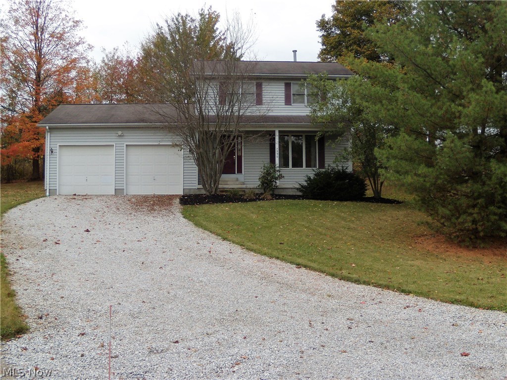 Welcome home to this beautiful 3 bedroom colonial located on a dead end street right in the heart of Garrettsville. The sunken living room greets you from the open foyer and features a 2 sided gas fireplace that also serves the dining room. The large kitchen with a breakfast bar has lots of cabinet space and opens to the dining room. A half bath next to the kitchen completes the main floor. The second floor offers a large master bedroom with an entry to the full bathroom plus 2 additional bedrooms. The basement with a plumbed full bath is partially finished awaiting your finishing touches. The 2 car attached garage has electric and water. Enjoy the outdoors on the covered front porch or the wooded backyard. This 1 owner home is in fantastic condition and has never seen children or pets. Close to dining, shopping and Hiram College. Schedule a private showing today, this one will go fast!