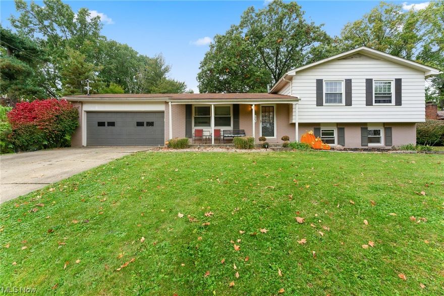 New Look and a new listing price on this wonderful home located in Howland School District.  home was completely renovated in 2015. A center wall was removed to create an open on-trend, modern first floor plan. The beautiful updated kitchen will wow your guests. It showcases an eat-at center island, custom cabinets, and comes fully equipped with all stainless steel appliances. The adjacent dining area and living room with beautiful flooring are all part of the open concept great room. Up a few stairs to the second level are 3 bedrooms, including the large master with his and hers closets and 2 beautifully updated full bathrooms. Just below the 1st floor is a wonderful recreation/media room, a 1/2 bath, laundry room and a bonus room which could be utilized as a 4th bedroom or office. Below grade is the partial basement that is clean and perfect for storage. Move right in, the main components to this amazing home were all updated during the 2015 remodel including, windows, roof, furnace air and water heater. This lovely, move in ready home has all the space your family needs to spread out, and plenty of room for entertaining  family and friends. The garage has a bump out to allow for a 3rd car, lawn equipment or can be closed off for a workshop. Fantastic fenced in back yard and patio with access into the kitchen via sliding glass doors. Don't miss an opportunity to own a home that is move in ready in a wonderful area close to Howland schools, shopping and dining.