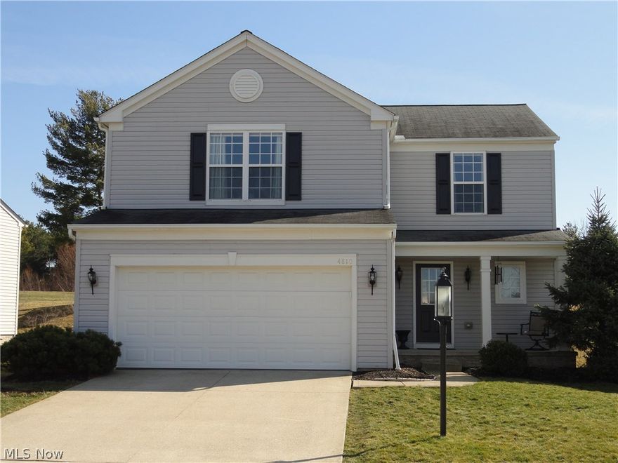 This sharp 4 bedroom 2.5 bath Colonial located in desirable Calls Farm is on a premium lot that overlooks and adjoins the grassy field and community fishing pond!  The home has been meticulously maintained and has appealing neutral décor.  Spacious living room with gas fireplace is open to the kitchen and dining area with windows across the back wall which keeps the house cheery and bright with plenty of daylight!  Sliding doors lead to deck porch for outdoor enjoyment!  Beautiful kitchen with espresso stained cabinets, mosaic backsplash and stainless steel appliances, Corian counters and hardwood floors.  1st floor laundry.  Master suite with private master bath and walk in closet.  Large basement ready to finish.  The Calls Farm community offer a center green with playground, active HOA events (picnics & parties) and walking trails.  Convenient to everything!