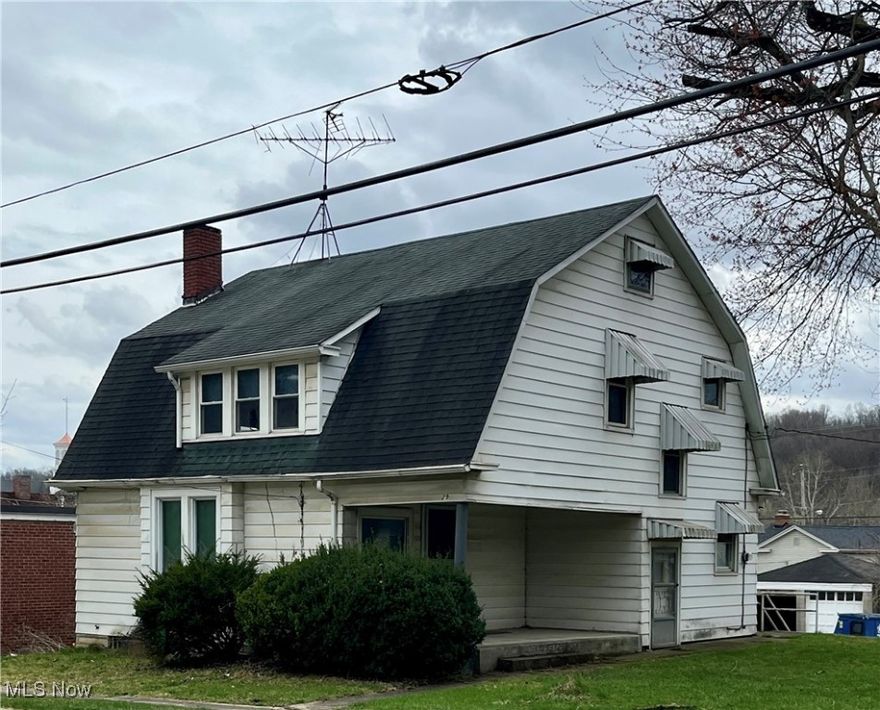 Check it out! Investors: Property being sold AS IS!

This home boasts grand styling, Beautiful woodwork and Expansive rooms. 2 car detached garage with access from alley way. 

Replacement windows.

Fireplace is decorative (not functioning).