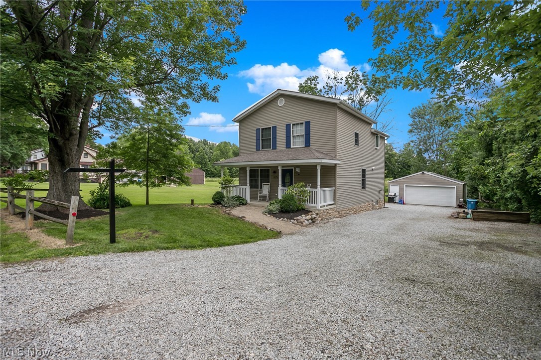 Welcome home to this completely renovated home with Open Floor Plan. This home was rebuilt from the studs in 2009 including foundation, roof, windows, doors, furnace, hot water tank, water softener, sump pump and glass block windows in the basement and new electrical panel and service. A new well was dug in 2009, new septic system 2015. This home is well maintained, freshly painted and located in beautiful Copley Township. The first floor features large eat-in kitchen with granite counter tops, great room/ living room, laundry room and full bath. Second floor has 3 nice sized bedrooms. Master bedroom has a master bath both with new flooring and 2 closets. All three bathrooms have been completed renovated. The home features a lovely front porch and a back deck which overlooks the .96 acre yard and field and is up against 55 plush private acres and offers 2.5 car garage for the car collector in you. Ready to move into and enjoy. Call for your private showing.