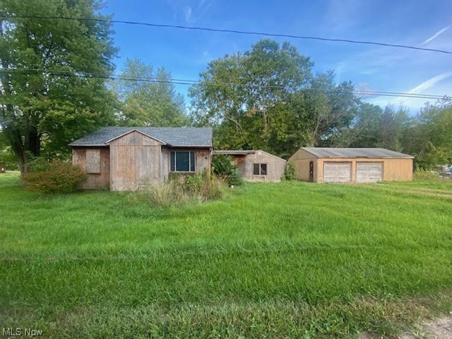 This charming 3-bedroom, 1-bath, 2 car garage home in LaBrae school district has endless potential!!  Nestled on a corner .8 acre lot, this gem is waiting for your personal touch. With a little love & imagination you can make your mark on home ownership or a smart investment. There is a spacious living room perfect for large gatherings,.  A separate office area provides flexibility for remote work or hobbies.  Enjoy the convenience of a dedicated laundry room & hardwood flooring in the three bedrooms.  The roof appears newer within the last 5 years. This hidden treasure is located on a dead end road in an area slated for city sewers in the near future.  The septic should only require a "band-aid" till sewers are installed.  Home is being sold AS-IS to settle an estate.