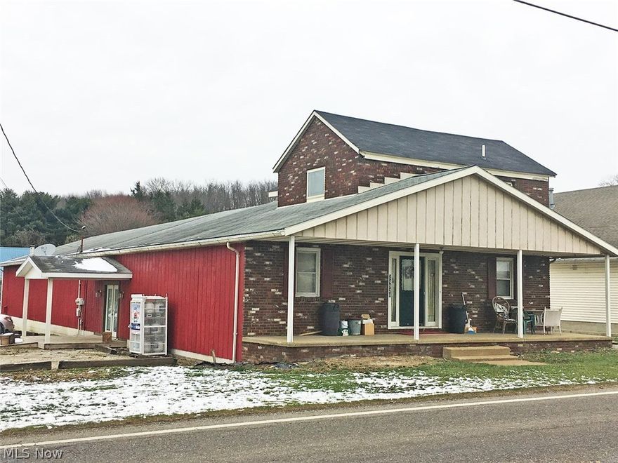 Commercial Building with living quarters - Former Carhartt/Clothing store - Ideal for owner occupancy business - Separate utilities - No zoning - Residence rented for %500 per month + utilities since 2002 - Great exposure - Retail area approx 3,500 sq ft.