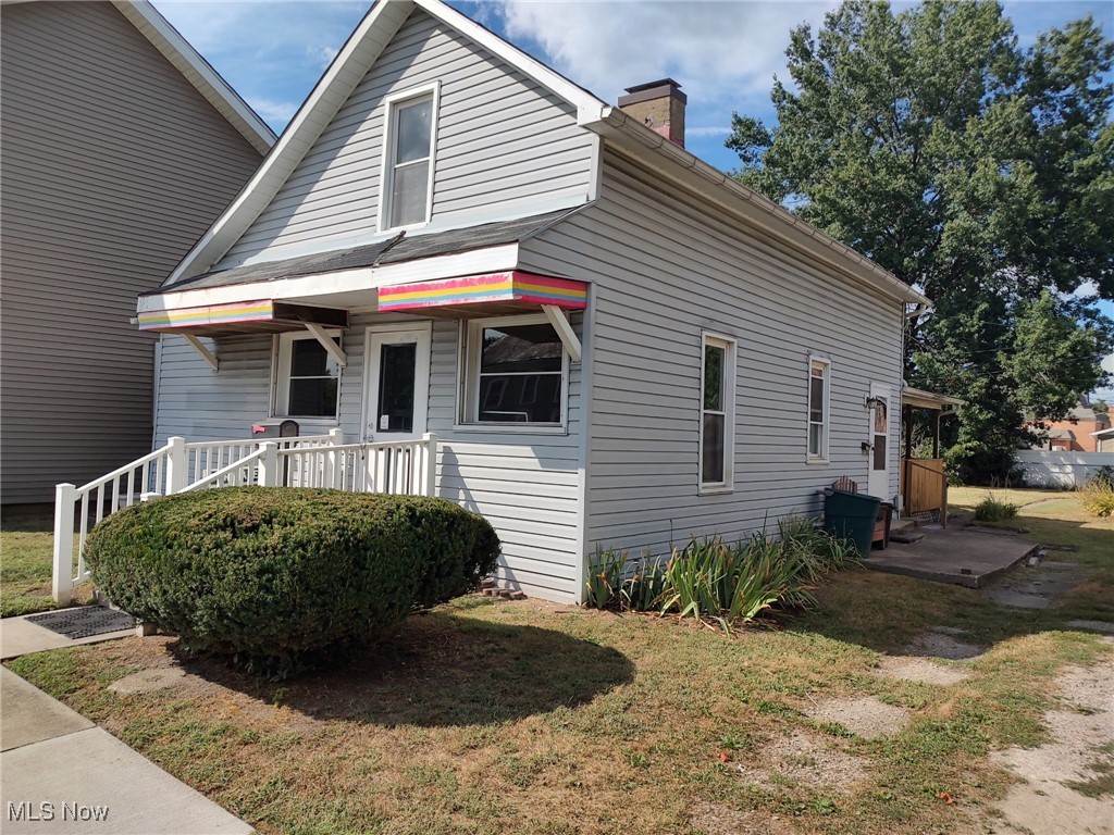 This property was Jeannes Beauty Salon for many years. Beauty shop in front and 2-bedroom apartment in back and upstairs. Does have a garage and shed. Nice sized yard, would make a great parking lot.