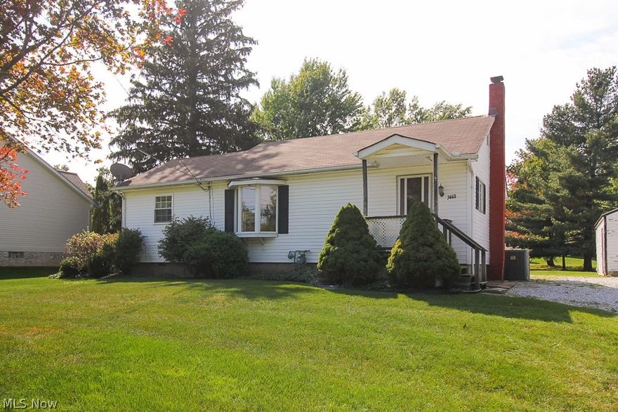 Location Location Location - This Cozy Two Bedroom Ranch is on 2 parcels for almost 1 acre!  The spacious living room and dining room opens up to the kitchen and there is a large master bedroom.  Did I mention the Beautiful Hardwood Floors!  Newer Furnace when converted over to gas, 2019 Hot water tank, Newer AC,  2010 New windows, Vinyl Siding, Detached 1 car garage. The fabulous location is near it all - shopping, dining, hospital, freeway access, golf and more!  Home is being sold as is.  Septic was installed in 2009 and has been well maintained.  Full basement with walkout!  Deck off of the family room is great for grilling and hanging out.  Come see this great deal today!