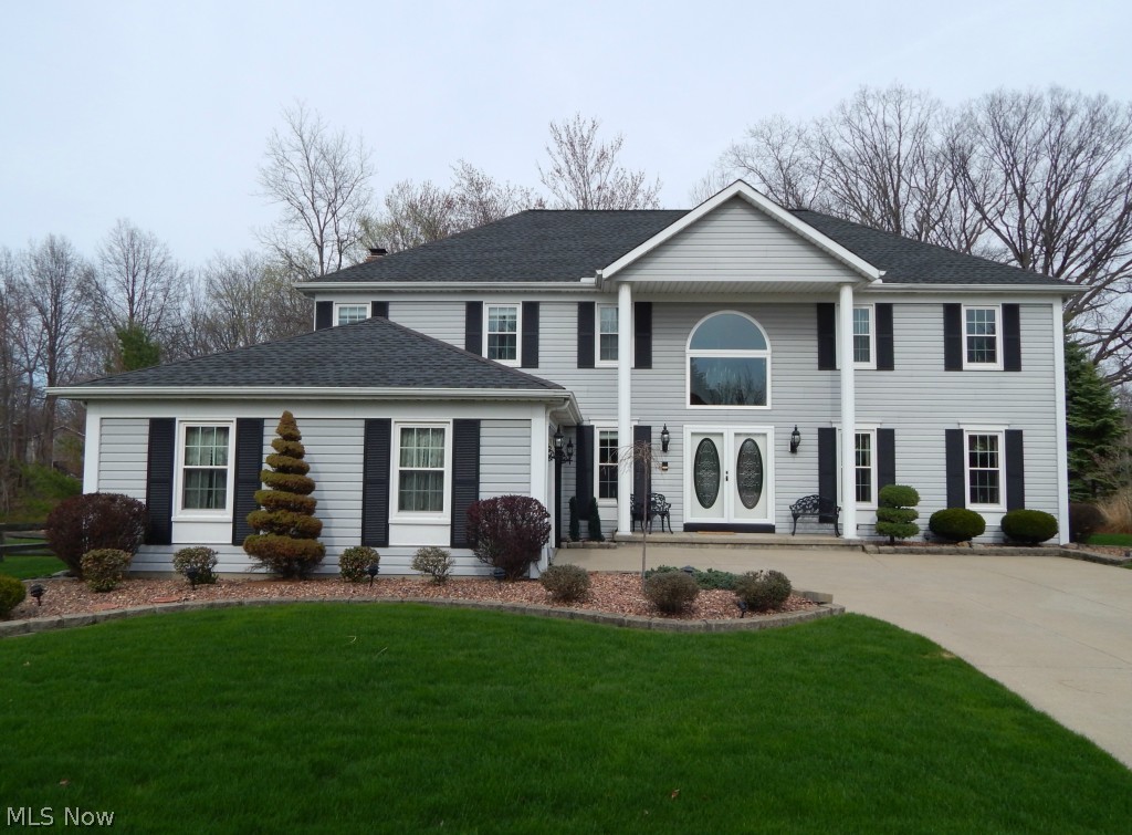 Spectacular Strongsville Colonial Has It All! 4 Bedrooms, 4 FULL Baths and a Finished Walk-Out Basement. Recent upgrades and updates include: New granite counter tops, kitchen appliances, windows, doors and furnace. 3004 Square feet with an additional 1000+ square feet of finished basement. Park-like yard backs up to a natural creek. Large kitchen opens to great family room that features a wet bar and fireplace. Master Suite boasts a vaulted ceiling, walk-in closet and luxury bath. Walk-Out basement features a fireplace, bar and full bath, plus the pool table stays with the home. This home is a MUST SEE!