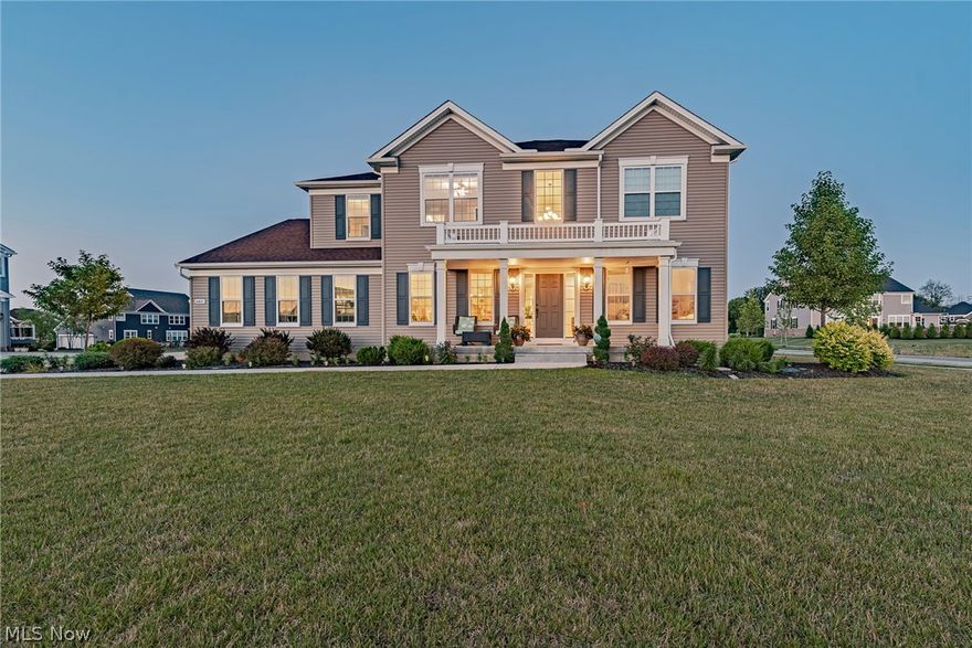 Fall in love with this stunning newer construction colonial in Hudson! This charming home features an open floor plan, a gorgeous kitchen, and an additional 50k in upgrades after being built. As you step inside the foyer, you will find the formal dining room on your left and the living room to your right. The family room features a cozy fireplace and is open to the kitchen, which features gleaming hardwood floors, granite counters, stainless steel appliances, and a sunny eat-in area with deck access. A bonus sitting area and a half bath complete the first floor. Upstairs, you are sure to love the master suite, which includes a lovely en suite bath with double sinks, a step-in shower, a soaking tub, and a walk-in closet. A guest suite with a private full bath, two additional bedrooms, a full bath, a convenient laundry room and a bonus loft area round off the second floor. The finished lower level includes a spacious rec room with a gorgeous wet bar, a fifth bedroom, a full bath, and ple