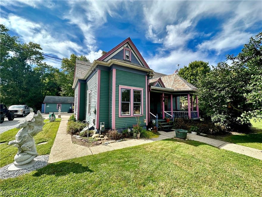 Step back in time and embrace the timeless charm of this remarkable 2-story Victorian home located in the heart of Historic Zoar. Built in 1901, this architectural gem exudes century-old elegance and craftsmanship, offering a truly unique living experience. Boasting 5 bedrooms, 3 bathrooms, and a rare 4-car attached garage, this home seamlessly blends historic character with modern convenience. The spacious rooms are adorned with exquisite oak hardwood trim and gleaming hardwood flooring, creating an inviting atmosphere throughout. The kitchen, complete with appliances, island, oak cupboards, and crown molding, is a chef's delight, while the adjacent full bathroom showcases unique lighting and cabinetry design. Two grand bedrooms on the main floor, including one currently used as a second living room, offer flexibility and comfort, while the main living room features a stunning original fireplace, adding warmth and character to the space. Ascend the solid wood staircase to discover three additional bedrooms and two bathrooms, each reflecting the home's exceptional quality and craftsmanship. The basement, with its brick walls and floors, provides ample storage and living space, with a convenient walkout door for easy access. The recently insulated attached garage offers added convenience, with water, cement floors, drains, and overhead storage. Outside, a large flat yard and detached garage/storage area provide space for outdoor enjoyment and storage of toys and lawn equipment. With its unique features, exceptional quality, and proximity to downtown Zoar and monumental sites, this home is truly a rare find. Conveniently located to Canton, New Philadelphia, Dover, and many other local attractions. Don't miss the opportunity to make it yours—schedule a showing today!"