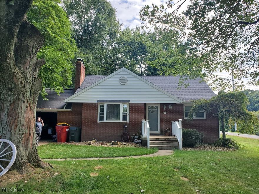 GREAT LOCATION, minutes from the highway, schools & shopping.  3 - possible 4 bedrooms, brick home on large corner lot.