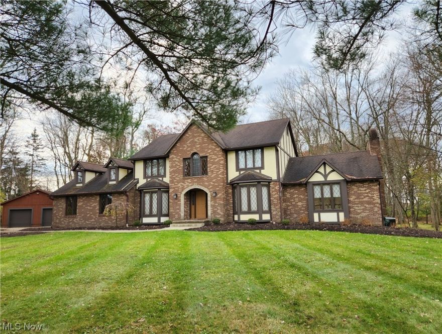 Come and enjoy the Privacy on this 1.08 Ac cul-de-sac lot just outside of Steiner Heights! This 2, 598 sq. ft. Tudor style home has good bones with its 4 Bedrooms and 3 1/2 Bath with a finished lower level including a full bath. This home has a large Foyer, first floor study/office, very large Kitchen and dinette, formal Dining Room, Cathedral Ceilings in the Great Room with built-in bookcases, brick fireplace, and a wall of glass sliding door to let the outside views in. There is a domed ceiling in the Master Bedroom, a Master Bath and Walk-in Closet. Convenient first floor laundry and a whole house fam. Car enthusiasts will love the 3-car Garage and 56x29 Pole Building and nature lovers will enjoy the 36x18 deck with views of the woods. Well maintained home. Both upstairs Bedrooms were updated with new commodes and tile in 2018. Septic pumped every 2-3 years. Come and see for yourself how you can make this home into your dream home!