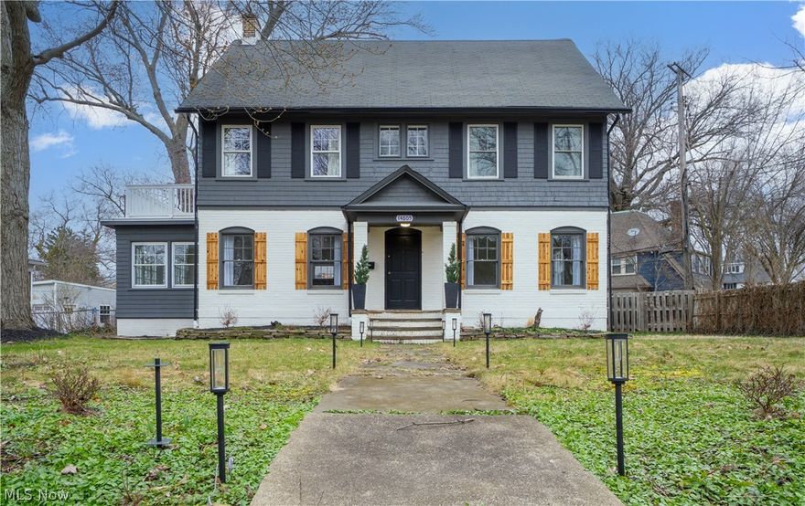 This gorgeous white brick home in Shaker Heights has been professionally renovated to meet the needs of any large family. The kitchen has been remodeled with tile flooring, all white cabinetry, new countertops, and all new stainless steal appliances. New lighting has been placed throughout the entire home. There's refinished hardwood flooring in the spacious dining room as well as the living room. A beautiful brick fireplace with a white mantel and a tile hearth make the living room warm and cozy. The first floor also sports a bonus room that could double as an extra bedroom, mud room, office, playroom, or whatever your heart desires. The 2nd floor has 4 bedrooms with hardwood flooring and 2 full baths that have been updated with tile flooring and white vanities. The 5th bedroom is on the 3rd floor. It has fresh new carpeting and an updated bathroom. The basement has also been finished with all new carpeting providing the home with a 2nd living room, hang out area, or another bedroom for extra large familes! The basement also has a very nice black brick fireplace and a half bathroom that has been updated as well. The paved driveway leads to a recently repaired garage with a new roof and new garage door. This home is in a very nice neighborhood and is close to parks, bus stops, and hospitals. Come and make this beautiful home yours today!