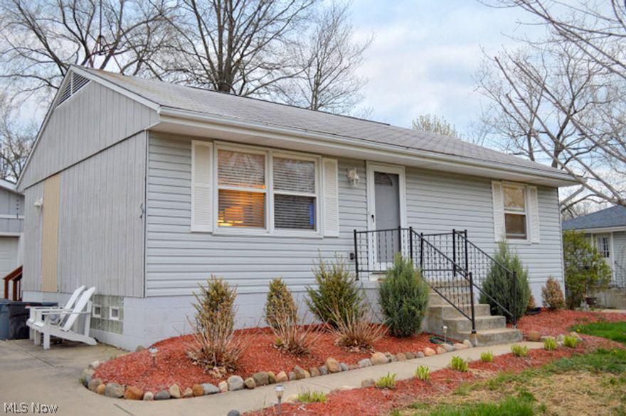 Wow !   This 2-3 bedroom, 2 full bath ranch has had a ton of remodeling and improvements.  Located on a lightly traveled street, this one would be great for those liking some outdoor entertaining on the deck overlooking the spacious, fenced in back yard and the park behind this lot.  Inside was nicely remodeled, walls opened to create a more open floor plan between the living room & kitchen area, newer cabinets, appliances & countertops, Bamboo flooring accents these two areas.  The full bathroom was also updated with modern tile in the shower and on the floor, all new fixtures as well.  Both bedrooms on the main level are nice size with good closet space.   Most of the lower level is finished with a combination family room and bar, the 2nd full bath is quite convenient.  The "other" room on this level could be an office or 3rd bedroom- the window in this room is large enough to exit out to the ground level.   Newer well pump, water heater, furnace replaced in 2013.   Neutral decor !