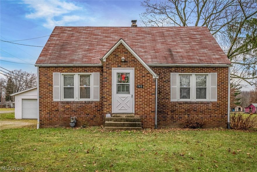 Adorable brick bungalow in West Branch Schools. This charming home offers 3 bedrooms 1 bath plus arched doorways & a nice sized kitchen. The relaxing back porch overlooks the peaceful 1/2 acre lot. The extra large 2 car garage is complimented by the 1/2 circle driveway! This home has been well loved for many years & is ready for its new owners to call it home.  Brand new septic system.