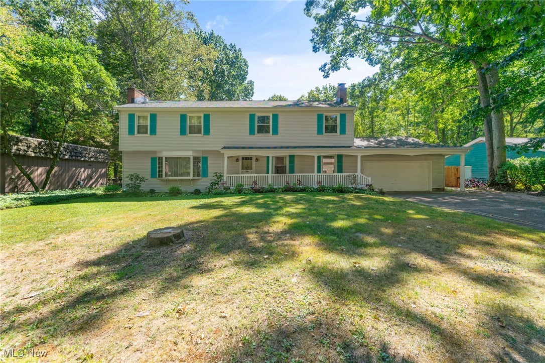 Space abounds in this large 4 bed, 3.5 bath home in Liberty school district! Walk in to the spacious living room with gas fireplace and new LVT flooring. Off the living room you’ll find a mudroom with access to the in the inground pool with a full bath. The updated kitchen is huge and offers plentiful cabinet space, beautiful quartz counters, LVT floors, new appliances, and a dining area with french doors to the pool. Enjoy the convenience of first floor laundry with additional access to the private backyard and attached, heated 2 car garage with two 220 outlets. The first floor is complete with cozy den, complete with wood burning fireplace, wet bar, restored hardwood floors, and ½ bath. All 4 bedrooms are upstairs and showcase restored hardwood floors and spacious closets. The massive master suite features a fireplace, large walk-in closet, and amazing bath with double vanity, standalone tub, and gorgeous walk-in shower. You’ll find an additional updated full bath with LVT floors on this floor as well. The basement is clean and dry and offers lots of storage space. This home sits on a gorgeous 1.82 acres, with a heated pool, new landscaping, new fence, 3 storage sheds, and an old tennis court that could be renewed with a little TLC - you’ll love spending the warmer months outdoors at home! Additional updates include: HWT (2024), roof (5-6 years), pool heather/pump (3 years), kitchen (5 years), master bath (3 years). A one year home warranty is included for your worry-free purchase! Schedule your private showing today!