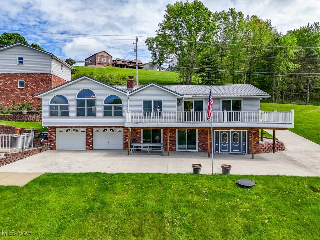 Stunning Lakefront Home with Breathtaking Views! Experience the ultimate lakefront lifestyle in this spacious 4-bedroom, 3-bathroom home, perfectly situated on 2.5 lakefront lots with 175 feet of water frontage! Designed for both relaxation and entertaining, this home features a living room, family room, and rec room—each offering stunning panoramic lake views. Step outside to your private oasis, complete with an inground pool and garage space for up to 6 cars—plenty of room for all your lake toys! Located in Lake Mohawk, a private, gated community with a 500-acre lake, unlimited horsepower boating, 3 beaches, tennis courts, and a 9-hole golf course, this home is your gateway to endless fun and relaxation. Don’t miss this rare opportunity—start making memories to last a lifetime!