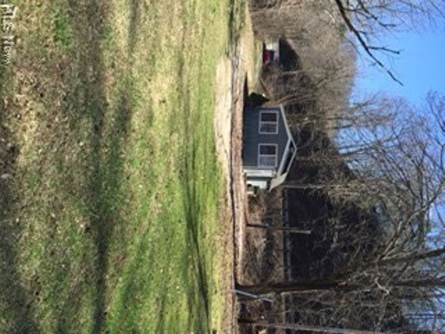 HUNTERS!!!!!! FISHING!!!!!ATV TRAILS!!!!!RAFTING/CANOEING!!!!! This cabin/home sits on 5ACRES+- the Walhonding River with a pavilion, access to fishing, camping, weekend home or live year round. EXCELLENT SITE FOR A BUSINESS DURING THE DIFFERENT SEASONS. LISTED AT $70,000 THE HOME IS FURNISHED/TURNKEY.       There is additional 63 ACRES+OR- property for Hunting or building sites ........lISTED AT ADDITIONAL $4,000 PER ACRE.   The road is hard surfaced between Warsaw and Nellie... Taxes to be determined. COULD BUILD ADDITIONAL CABINS IN THE WOODS.  "EXCELLENT WOODED HUNTING PROPERTY WITH ATV TRAILS, FISHING, REAFTING, AND MUCH MORE ON THE WALHONDING RIVER."  MAKE IT YOUR HOME OR HAVE A SEASONAL BUSINESS FOR THE OUTDOORS PERSONS*************Cabin sleeps eight with bedroom and loft. eat-in kitchen, living room and nice bath. Land can be bought without CABIN...Land must sell first. $12.00 assessment. MINERAL RIGHTS STAY WITH PROPERTY.  PROPERTY WAS TIMBERED 3-4 YEARS AGO... THIS IS A MUST