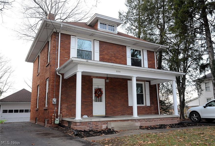 Stately north end  brick features 3 bedrooms, 2 full baths, finished basement, newer triple pane windows, cozy fireplace, 2 driveways, and public utilities