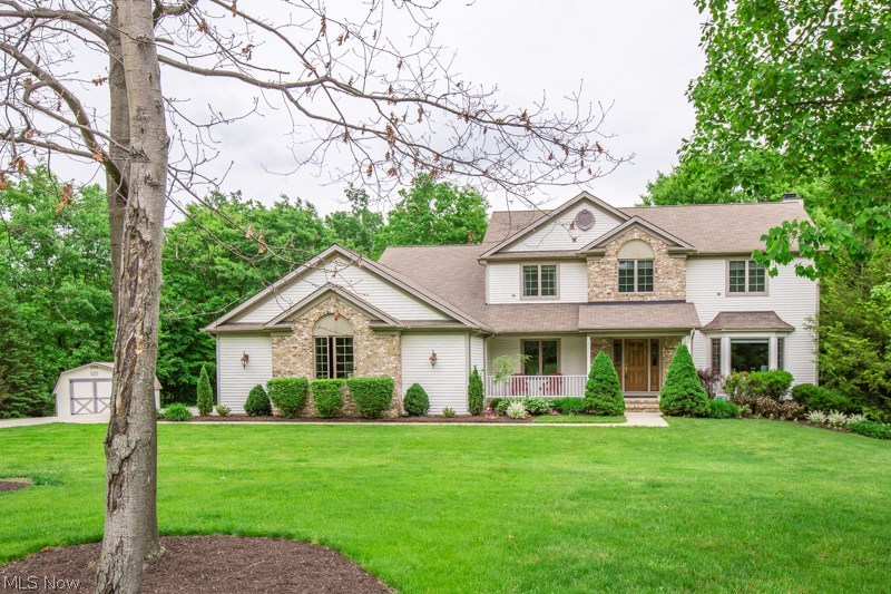 Beautifully appointed updates in this Campton Ridge colonial. Large kitchen, granite, SS appliances, tile backsplash, huge island, pantry, wood floor, leads to tiered deck w/ 18x16 covered veranda & 16x16 open (deck floor & railing updated summer 2013) overlooking private wooded yard kitchen open to FR w/ crown molding & oak framed fireplace. french doors to office (den or living room) w/ built in & bay window. Dining room has wainscoting, trey ceiling & crown molding. 8x6 mudroom features locker style built in wood cubbies, tile floor & closes w/ pocket door, Large laundry room w/ tile floor. Owner's suite features 11x8 walk in closet w/ built ins. 16x8 Owners Bath includes dual vanity w/ granite (2014) tile floor, soaking tub & warming lamp for cold days. also finished & separate vaulted sitting room, perfect for office or nursery. 3 additional spacious bedrooms w/ spacious closets & full bath w/granite. finished 25x26 12 course LL rec room, new carpet '14, HWT '13, well pump '09