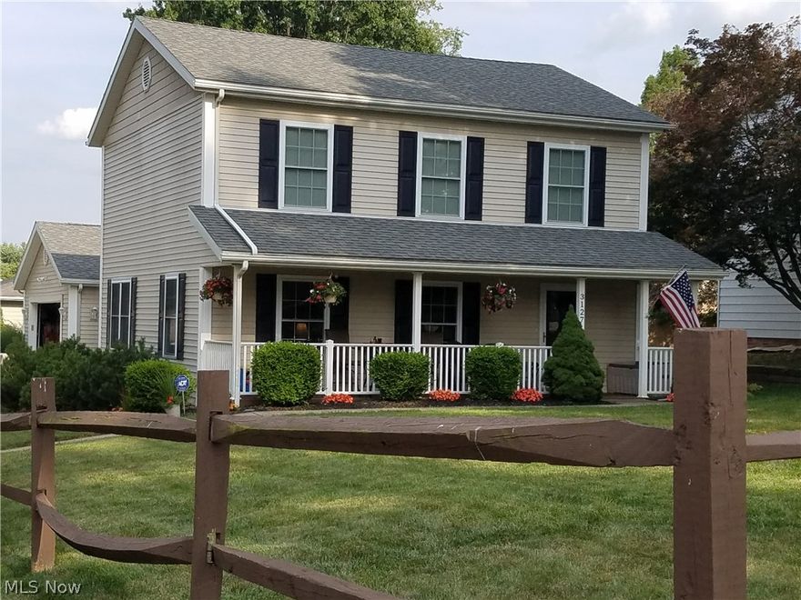 3127 Hudson Dr Cuyahoga Falls OH 44221 newer, beautiful colonial home built in 2004 on corner lot, easy access to the side entry driveway & 2 car attached garage. Privy gorgeous front porch to enjoy your coffee in the morning & sunsets at night, home also has back patio for your enjoyment. Features an open floor plan with cathedral, tray &vaulted ceilings & includes professional designer colors & lighting throughout. Besides the spacious formal living room that's open to large dining room, there's also cozy den in the back w/ cathedral ceiling. Kitchen & dining room have laminate wood floors & includes breakfast bar for 4, lots of counter space for serving & cooking, gorgeous maple cabinets & stainless steel appliances. 3 bedrooms upstairs w/ vaulted ceilings, including master suite w/ private bath & walk-in closet. Extremely energy efficient steel reinforced & insulated foam walls, Life Breath furnace continually circulates fresh air powered by water heater, highest gas bill $70!  Man