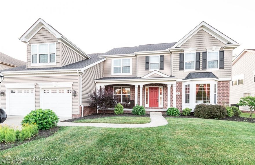 Absolutely stunning custom built colonial in Willowbrook.  Built by Drees Homes this one is loaded with upgrades and has it all! Bright open floor plan with great natural light.  Gleaming hardwood floors flow through the first floor.  Huge gourmet kitchen open to the 2 story family room with gas fireplace and a wall of windows.  Formal dining and living rooms.  Sunroom/office /playroom overlooking the magnificent paver patio featuring a pergola and a stone fire pit.  Upstairs there are 4 bedrooms and a large bonus room with sitting area.  The master suite has hardwood floors, vaulted ceiling, his and hers walk in closets and a luxurious master bathroom.  The lower level is finished with a full bath, huge rec room, bar area,  workout room, workshop and tons of storage space.  The beautifully landscaped yard has a nine zone irrigation system.  The private rear yard backs to a wooded common area.  Truly a gorgeous home! Schedule your private tour today!