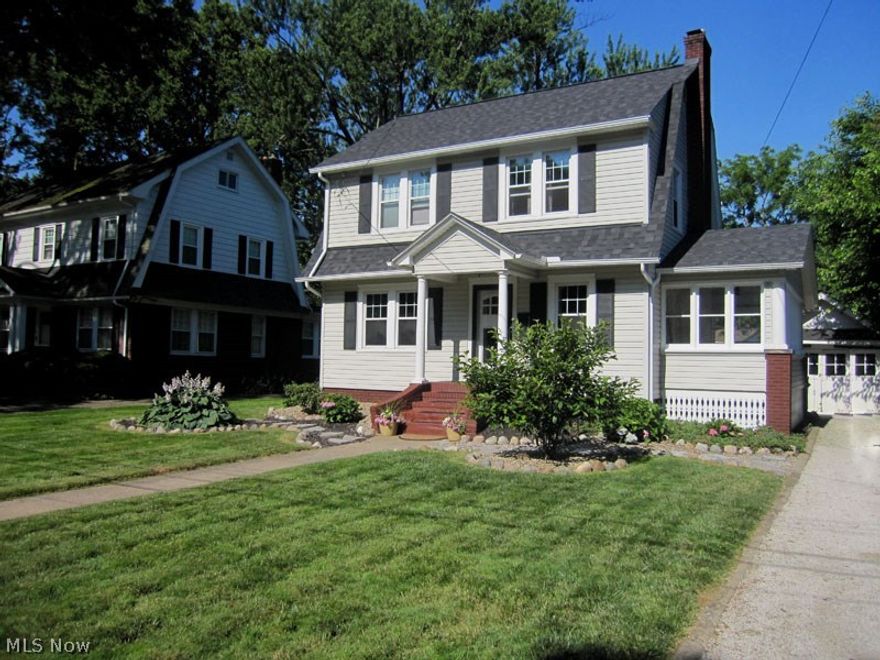 Absolutely gorgeous Dutch colonial with updates galore! Exposed hardwood floors and natural woodwork, all windows are vinyl replacement (low E) w/warranty. Roof replaced in 2015, tear-off with 25 year dimensional year shingle with warranty. A/C new in 2013. Kitchen completely remodeled in 2009 including granite counters and backsplash, Thomasville custom cabinetry plus beautiful crown molding. Dual staircase from both kitchen and living room. All newer stainless steel appliances will stay with the property. Both full and 1/2 bath completely remodeled. Full bath features California slate flooring and half walls, all new fixtures plus jetted bathtub and laundry shute to basement. Breathtaking terraced back yard features a rock zen garden entertaining area, professionally landscaped with rocks and perennial plants to enjoy for years. Beautiful freeform sandstone steps leading to lower terrace. Relaxing rope hammock in back yard will stay. Enjoy Cuyahoga Falls utilities and amenities. This