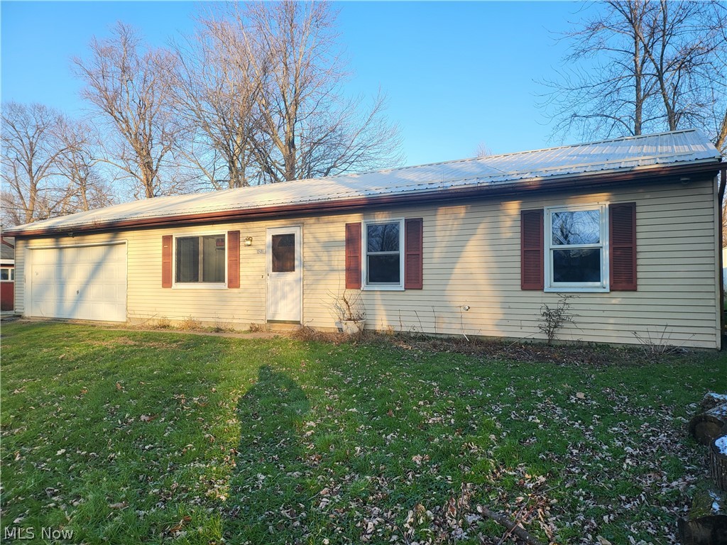 Nestled in Madison north of Route 20 this 1,200 square foot ranch house built on a slab is waiting for its next owner to come in and show this metal roofed home some love. Open floor plan awaits as you walk into the living room connected to a wide open dining room and kitchen. With 3 bedrooms this home is ready and waiting for your embrace.
