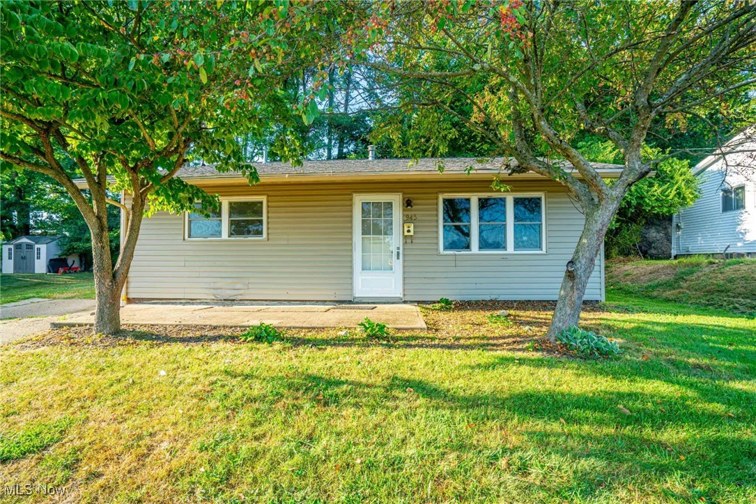 Located at the top of a quiet cul-de-sac, this 3-bedroom, 1-bath home offers great potential for the right buyer. Nestled up a hill, the property provides privacy while still being just minutes from shopping, restaurants, and other amenities. Inside, you'll find updated kitchen cabinets already in place, providing a solid start for future updates. The layout is simple and functional, with an eat-in kitchen, three bedrooms and one full bathroom all on a single level. The home needs some TLC but offers a great opportunity to make it your own—whether you're a first-time buyer ready to build equity, or looking to downsize and customize to your tastes. A shed in the backyard stays with the property, offering extra storage or workspace. With its quiet location, solid bones, and room for improvement, this home is full of potential. Come see what you can create!
