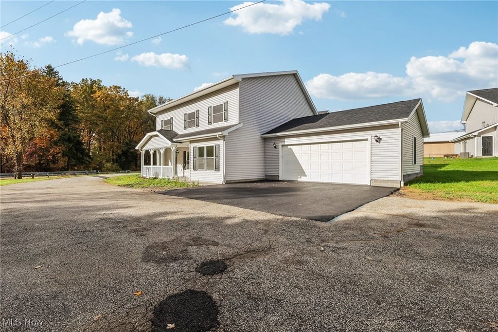 Photo of 1873 US Highway 6 #C, Roaming Shores, OH 44085 (MLS # 5167658)