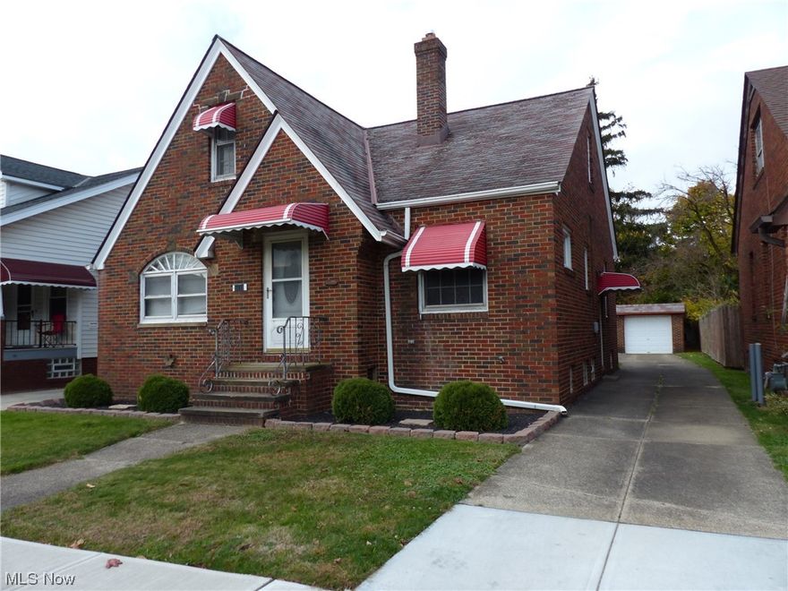 Conveniently located in Old Brooklyn, near 480, this 3-bedroom brick bungalow is priced to sell, as is. .12-acre lot with 2 car detached garage and back patio. Front entrance to a foyer with access to an enclosed front porch with beautiful wood slat ceiling. Living room with double access to eat-in kitchen w/ built-in china cabinet, Stove and Fridge stay. 2 bedrooms with HW flooring on level one plus a full bath. Up bedroom offers hardwood flooring and extra room perfect for a small nursery or office area, storage closets plus a cedar closet. Rec room in basement with bar, storage/laundry room with workshop and washer/dryer and stationary tub. Bath with stall shower in lower level. Glass block basement windows. As is- Basement walls will need attention. Furnace looks newer but no age specified. Home Warranty provided by the estate.
