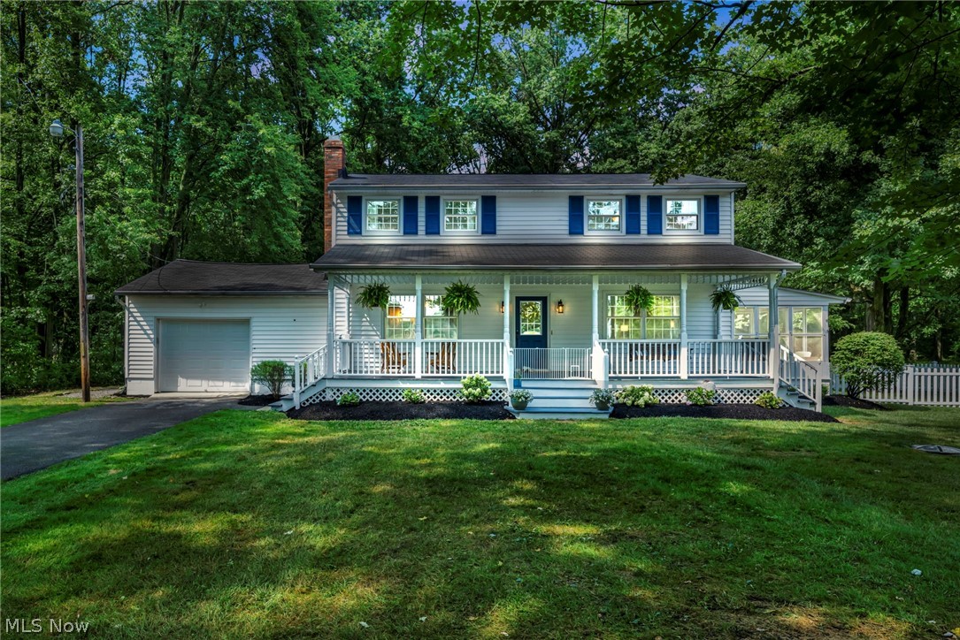 Discover the perfect blend of classic charm and modern luxury in this stunning colonial on a 4.3-acre estate. Set over 400 feet from the road, this property offers unparalleled privacy and tranquility, surrounded by over 2 acres of lush woods. Begin your day on the inviting front porch swing, enjoying the gentle breeze and soothing sounds of nature. This expansive porch leads into a home where elegance meets comfort, featuring updates such as new doors, hardware, flooring, and fresh paint.
The open-concept design is anchored by a newly renovated kitchen, featuring sleek quartz countertops, a matching backsplash, and stylish new cabinets and sink. This modern culinary space flows seamlessly into the dining room, ideal for both everyday meals and entertaining guests. Adjacent to the kitchen, a thoughtfully designed first-floor half bath and laundry room with backyard access enhance the home's practicality.
To the right of the foyer, the expansive Great Room offers ample space for relaxation and family gatherings. Just beyond, a beautifully updated 14x10 screened-in porch provides a serene retreat where you can unwind with a book or enjoy the tranquil sights and sounds of nature.
Upstairs, you'll find two additional bedrooms and a full bath, along with a luxurious master suite designed as your personal sanctuary. The master suite boasts generous closet space and a dreamy en-suite bath, complete with a walk-in tiled shower featuring dual shower heads, a new double vanity, and a spacious walk-in closet.
Outside, the property includes two storage sheds with ample space for a potential pole barn, this property offers endless space for customization.
Additional updates in the past seven years include a new furnace, hot water tank, garage door, and drain tile.
Embrace the ultimate in country living and modern sophistication with this elegant colonial retreat—where every detail has been crafted to provide comfort and style in a serene, private setting.