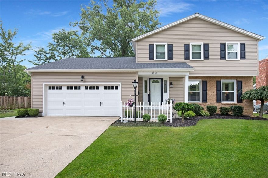 Pride of ownership lives in this 2 story home. Foyer with ceramic tile floors and coat closet. Living room area with carpet floors with new folding panel doors leading to formal dining room. (currently being used as a bedroom) The Kitchen has granite counter tops with travertine tile backsplash, newer light fixtures, tons of cabinets with extra storage, and appliance to stay. Family room with gas jet fireplace, panel walls, beams, carpet and sliding doors leading to a 20 X 16 deck. Updated 1st floor FULL bathroom with ceramic tile floor and granite countertops. 2nd level has 3 nice size bedrooms with carpet floors. A full bath with double sink, newer toilet, and ceramic tile floors. Clothes chute on second level. Full basement with Trane XV90 furnace, Aprilaire air cleaner , A/C, 40 gallon hot water tank, glass block windows and laundry area with washer and dryer(gas) to stay. Updated windows with tilt -in and safety locks. New vinyl siding, shutters, roof, gutters. 2 car garage with s