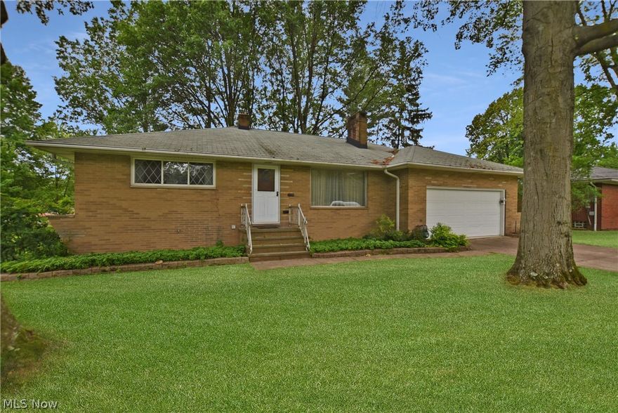 Full Brick 3 Bedroom Ranch with Walk out Basement.  Extra deep Lot!!  Replacement windows.  Covered Wood Floors on main level.  Maintenance Free Deck.  Wooded Lot, Gutter guards.  Prime Location.  A True Must See!!