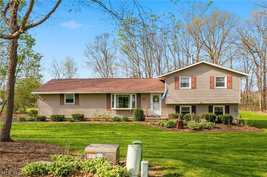 Welcome to 12555 Kaywood! This well kept home sits on two parcels coming to a total of .92 acres! Owner's took great care of the property as you'll see when you walk in. Nice sized living room with bay window supplies spectacular natural light. The kitchen has a great amount of cabinet space, a dinette area and sliding glass door to the covered deck in the backyard. Upstairs you will find three bedrooms and a full bath with a tub/shower combination. The bathtub is newer and the home offers replacement windows. Downstairs you will be welcomed into a large family room with a gas burning stove. Washer and dryer in the laundry area convey. An additional set of sliding glass doors lead back to the concrete patio. Relax in the serene backyard while enjoying the sounds of nature. Two car garage is extra deep. Storage shed as well! See today!