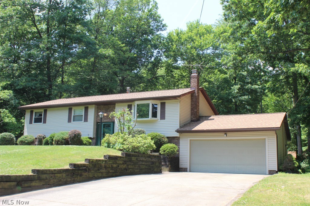 So much to offer in City of Green* This 4 bedroom/2.5 bath bi-level having 2448 total square ft. situated on private .72 acres has numerous updates plus 30x40 insulated building with heat and water* Main level with living room with bay window, formal dining, eat in kitchen with slider to deck/balcony, 3 bedrooms including master with master bath & guest bath, new carpet (2016) & new ceramic floor in kitchen & bathrooms (2016)* Walk out lower level with huge family room with wood burning fireplace, 4th bedrooms (used as an office), full bath, laundry area with shelves & includes washer & dryer* Sliding door off of family room to 3 season sun room wrapped with windows, nature stone floor & includes hot tub* Attached 2 car garage with cabinets, work bench, opener & service door* 30x40 barn with loft (approx. 1/3 of building), concrete floor, insulated, electric heat, water & new shingles (2016)* Other updates include house shingles, single layer (2016), siding (2015), windows (2012)* Wate